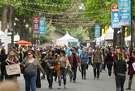 Hundreds make their way down Main Street during the first day of Bottle Rock Music Festival in Napa, Calif. Friday, May 25, 2018