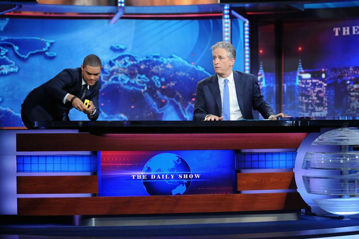NEW YORK, NY - AUGUST 06: Trevor Noah and host Jon Stewart appear on "The Daily Show with Jon Stewart" #JonVoyage on August 6, 2015 in New York City. (Photo by Brad Barket/Getty Images for Comedy Central)