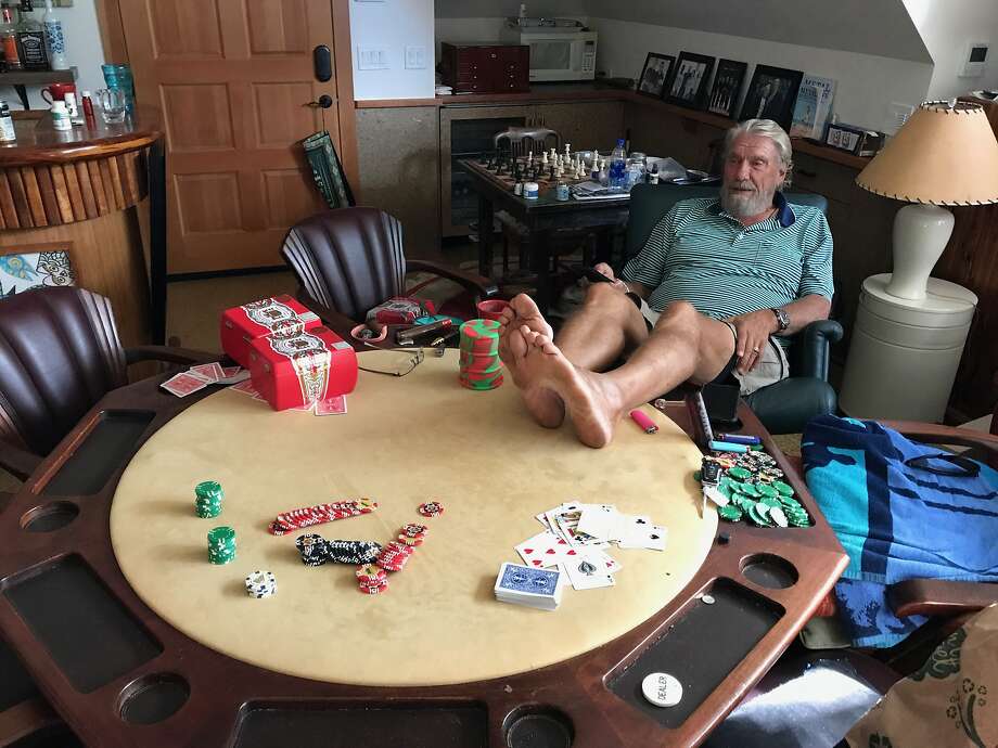 Don Nelson watches Game 5 of the Warriors-Rockets series from the poker room of his house in Maui. He says he never leaves the island anymore, but he watching every Warriors game. Photo: Scott Ostler / The Chronicle