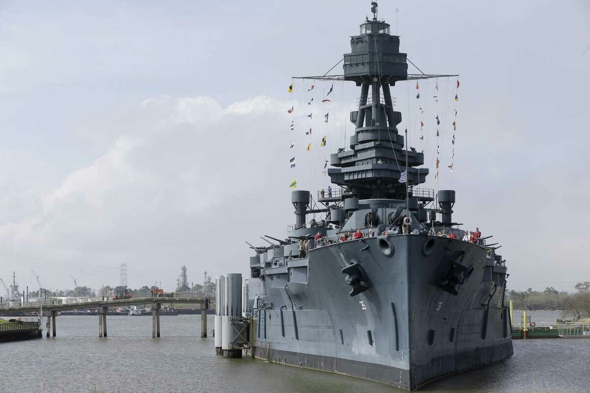 People are shown during a program on the Battleship Texas on Feb. 18, 2018, in Houston. The event was in commemoration of the 73rd anniversary of the Battle of Iwo Jima.