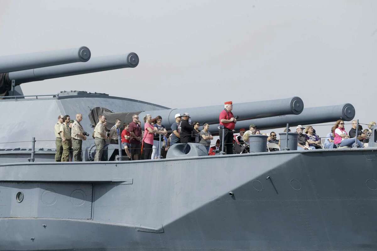 People are shown during a program on the Battleship Texas on Feb. 18, 2018, in Houston. The event was in commemoration of the 73rd anniversary of the Battle of Iwo Jima.