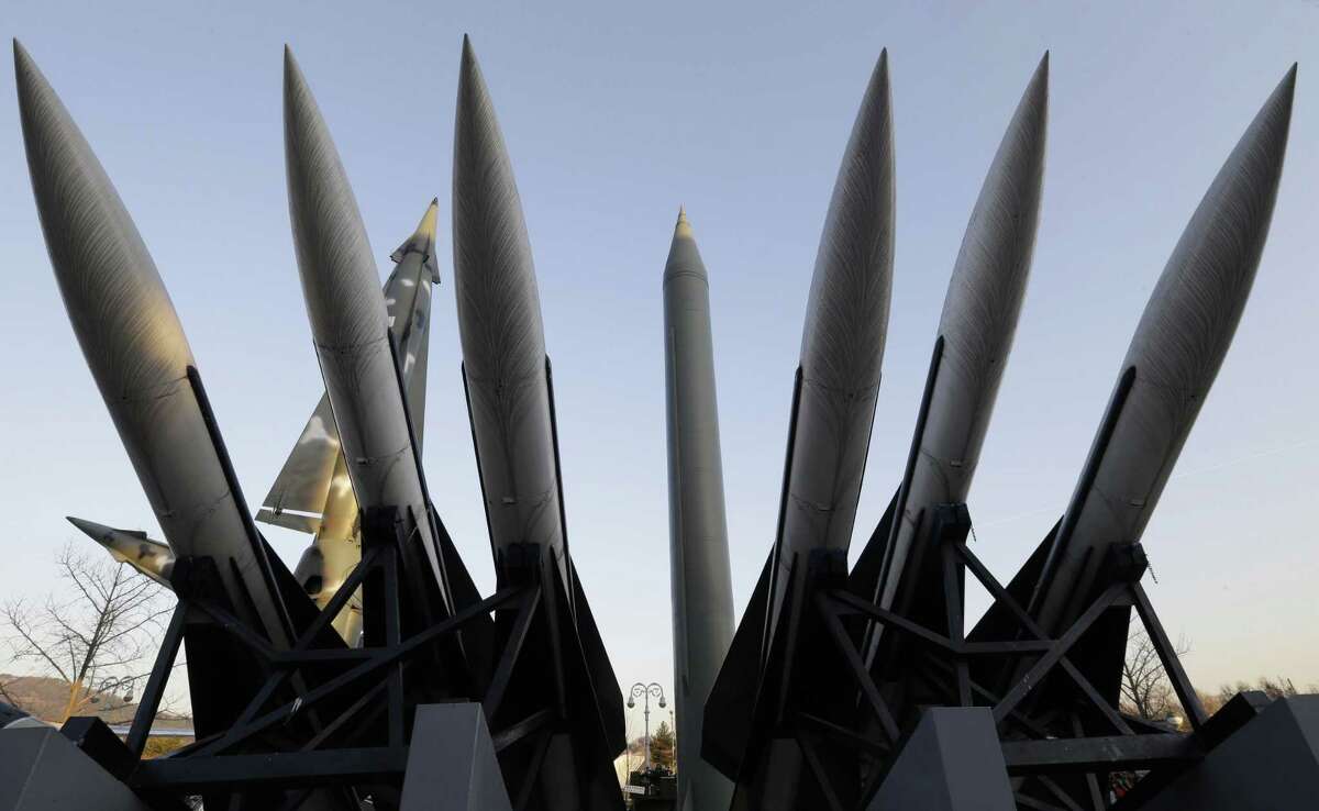 In this Dec. 26, 2014 file photo, a North Korea's mock Scud-B missile, center, stands among South Korean missiles displayed at Korea War Memorial Museum in Seoul, South Korea. South Korea said Tuesday, Jan. 6, 2015 that rival North Korea has a 6,000-member cyber army dedicated to disrupting the South's military and government. The figure is a dramatic increase from its earlier estimate that the North had a cyberwarfare staff of 3,000. Seoul's Defense Ministry said in a report that North Korea may also have gained the ability to strike the U.S. mainland because of its recent progress in missile technology, which was demonstrated in five long-range missile tests in 2009 and 2012, and is advancing in efforts to miniaturize nuclear warheads to mount on such missiles.