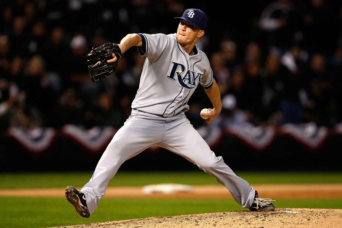 CHICAGO - OCTOBER 06: J.P. Howell #39 of the Tampa Bay Rays throws a pitch against the Chicago White Sox in Game Four of the ALDS during the 2008 MLB Playoffs at U.S. Cellular Field on October 6, 2008 in Chicago, Illinois. (Photo by Jamie Squire/Getty Images)