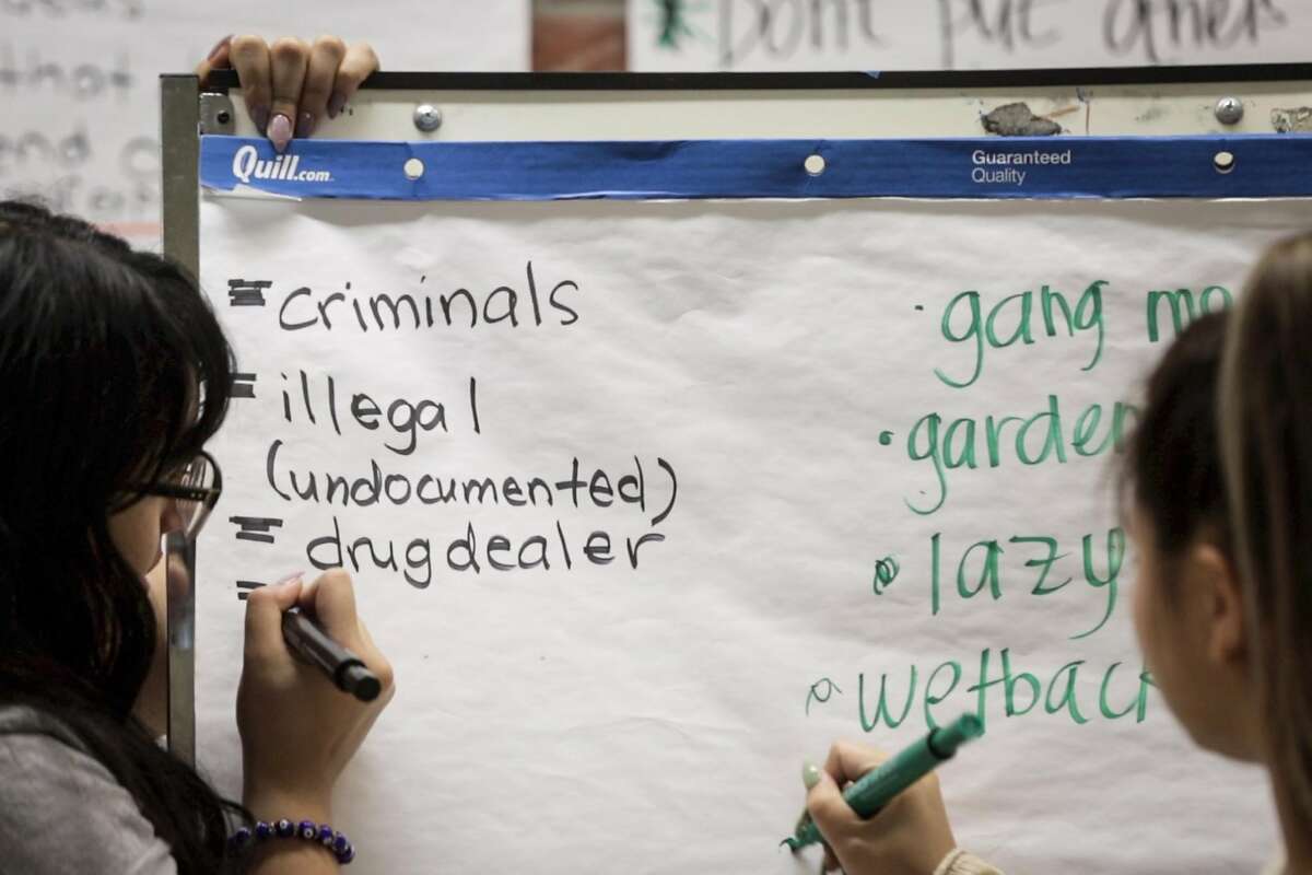 Derogatory slurs for Latino's are seen as they are written on a white board during the stereotyping exercise at Camp Everytown in Boulder Creek, California on Wednesday, October 11, 2017.