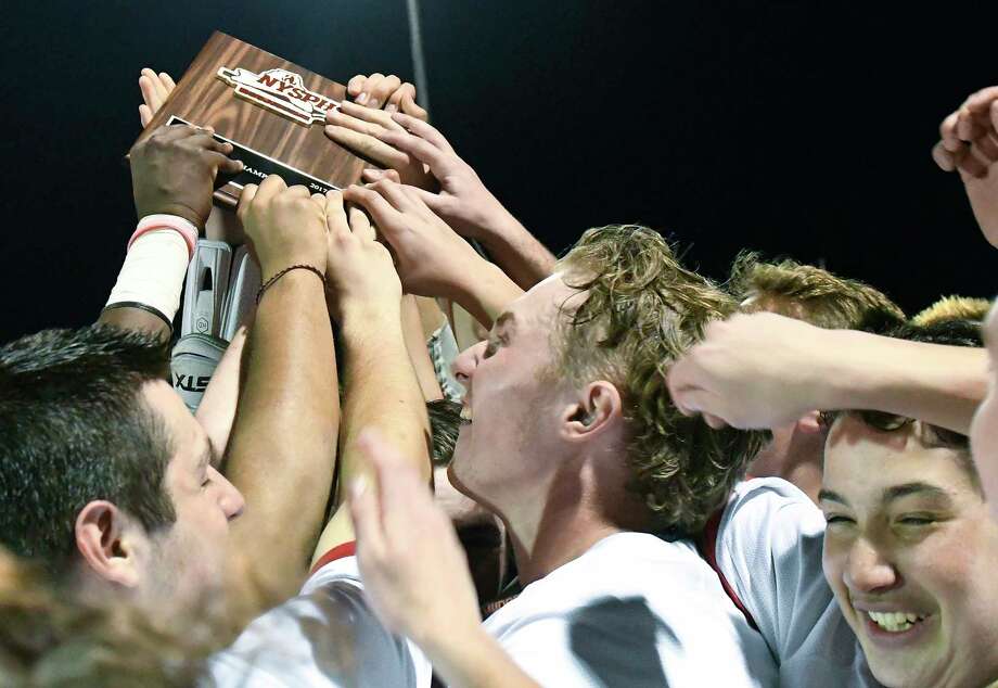 Niskayuna's players celebrate a 20-9 win against Shenendehowa during a Section II Class A Boys' lacrosse final Friday, May 25, 2018, in East Greenbush N.Y. (Hans Pennink / Special to the Times Union) Photo: Hans Pennink / Hans Pennink