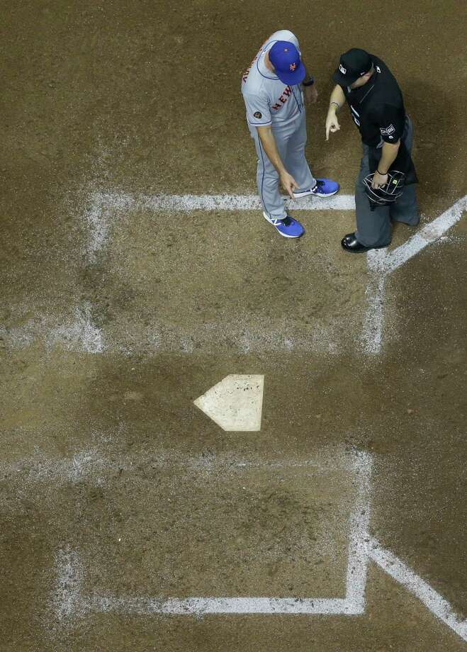 New York Mets manager Mickey Callaway argues a call with home plate umpire Mike Muchlinski during the ninth inning of a baseball game against the Milwaukee Brewers Friday, May 25, 2018, in Milwaukee. (AP Photo/Morry Gash) Photo: Morry Gash / Copyright 2018 The Associated Press. All rights reserved.