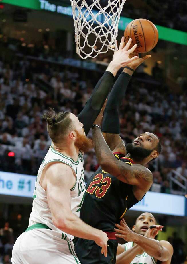 Cleveland Cavaliers' LeBron James, right, drives to the basket against Boston Celtics' Aron Baynes (46) during the first half of Game 6 of the NBA basketball Eastern Conference finals Friday, May 25, 2018, in Cleveland. (AP Photo/Ron Schwane) Photo: Ron Schwane / AP 2018