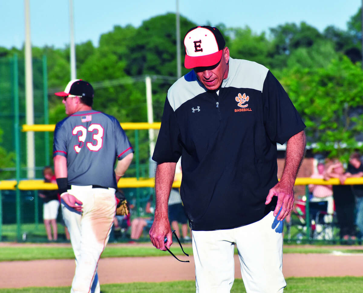 Mike Waldo walks away from the EHS mound for the last time as the Tiger pitching coach after a 39-year career.