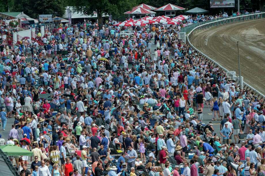 A large crowd was on hand for the 148th running of The Travers Stakes at the Saratoga Race Course in Saratoga Springs, N.Y.  (Skip Dickstein/Times Union) Photo: SKIP DICKSTEIN