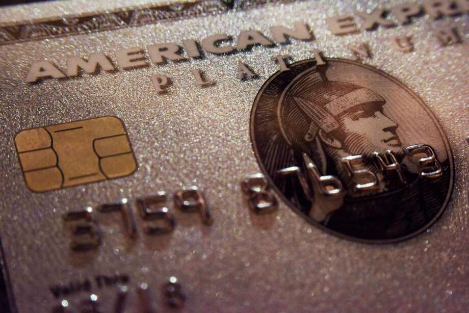 FILE - This Oct. 4, 2016, file photo shows a mockup of an American Express Platinum Card provided by the company, in New York. Credit card companies are taking the next step in using their points programs to influence what their millions of customers buy, going as far as influencing what color blender you might purchase. American Express is piloting a program that will allow merchants to reward specific customers for purchasing specific items at their stores, starting with the online merchant Boxed. (AP Photo/Patrick Sison, File) Photo: Patrick Sison / Patrick Sison