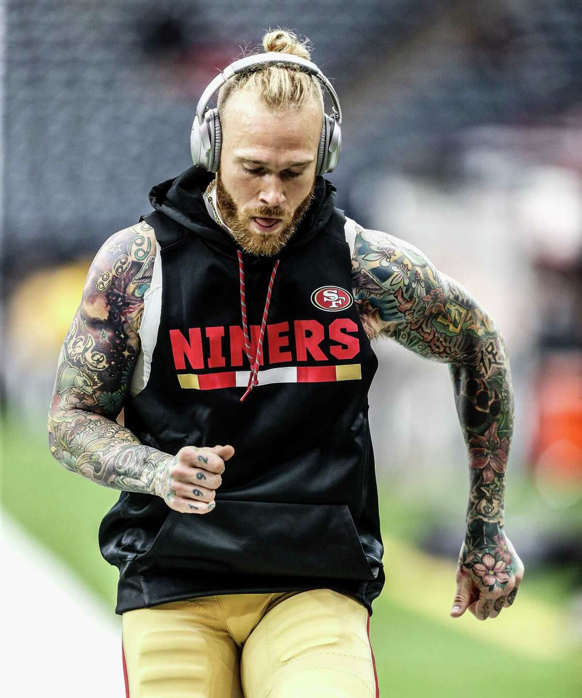 HOUSTON, TX - DECEMBER 10: Cassius Marsh #54 of the San Francisco 49ers warms up before playing the Houston Texans at NRG Stadium on December 10, 2017 in Houston, Texas. (Photo by Bob Levey/Getty Images)