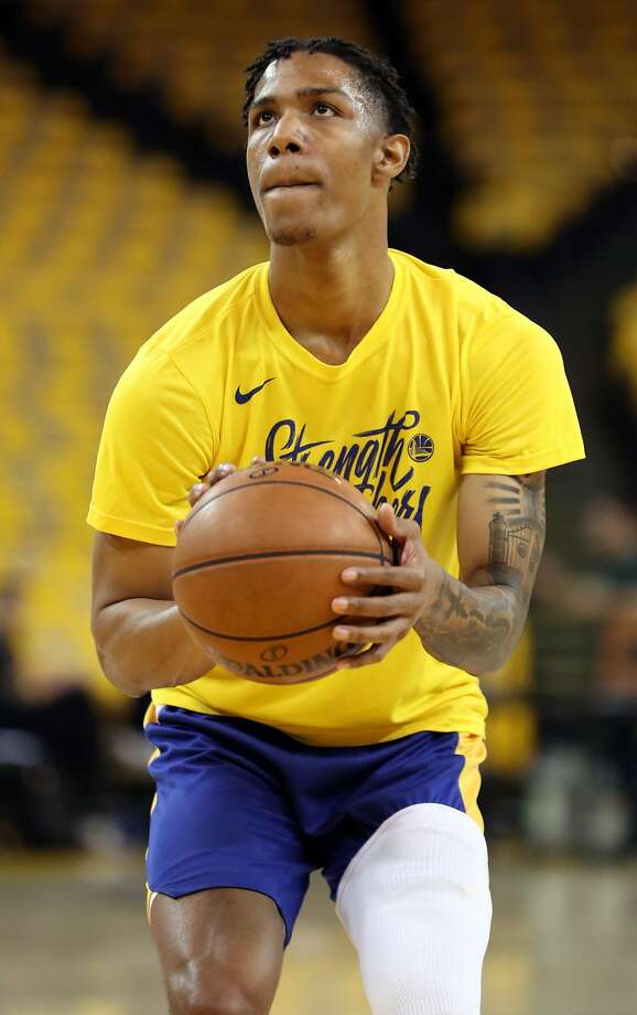 golden state warriors patrick mccaw warms up before warriors