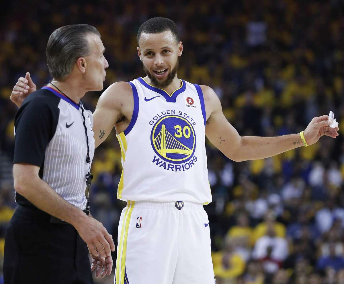 Golden State Warriors guard Stephen Curry (30) talks to referee Ken Mauer (41) during the first half of Game 6 of the NBA Western Conference Finals against the Houston Rockets at Oracle Arena, Saturday, May 26, 2018, in Oakland. ( Karen Warren / Houston Chronicle )