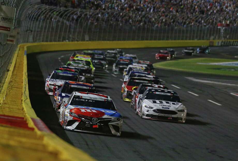 CHARLOTTE, NC - MAY 27:  Kyle Busch, driver of the #18 M&M's Red White & Blue Toyota, leads a pack of cars during the Monster Energy NASCAR Cup Series Coca-Cola 600 at Charlotte Motor Speedway on May 27, 2018 in Charlotte, North Carolina.  (Photo by Sarah Crabill/Getty Images) Photo: Sarah Crabill / 2018 Getty Images