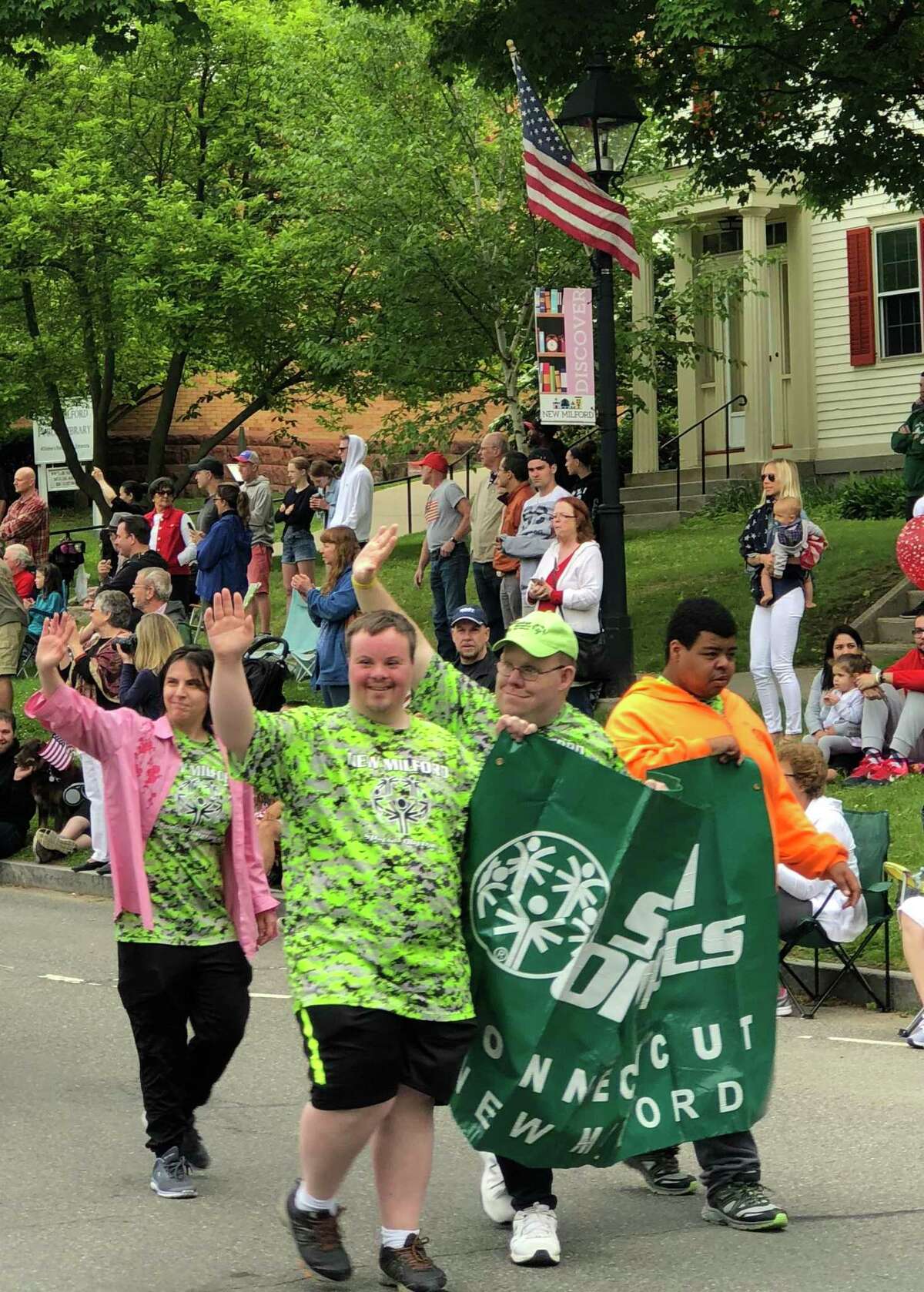 Spectrum/individuals representing Special Olympics proudly wave to the crowds lining Main Street during New Milford's Memorial Day parade May 28, 2018.