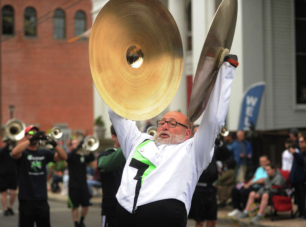 Alan DeSantis, of Wallingford, crashes the cymbals during a performance by the Connecticut Hurricanes marching band in the annual Derby-Shelton Memorial Day Parade in Derby, Conn. on Monday, May 28, 2018. Photo: Brian A. Pounds, Hearst Connecticut Media / Connecticut Post