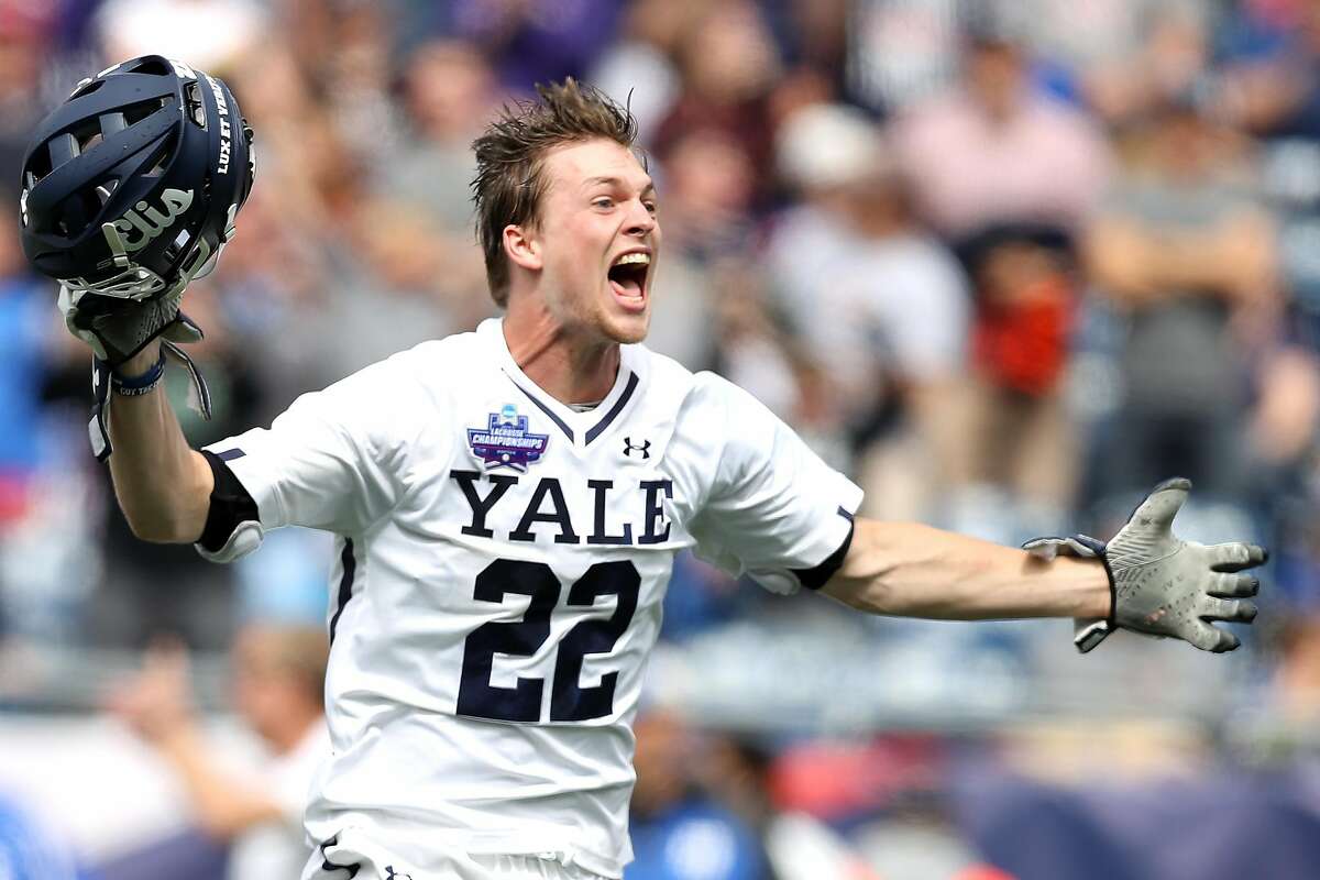 FOXBORO, MA - MAY 28: Ryan McQuaide #22 of the Yale Bulldogs celebrates after the Bulldogs defeat the Duke Blue Devils 13-11 in the 2018 NCAA Division I Men's Lacrosse Championship game at Gillette Stadium on May 28, 2018 in Boston, Massachusetts. (Photo by Maddie Meyer/Getty Images)