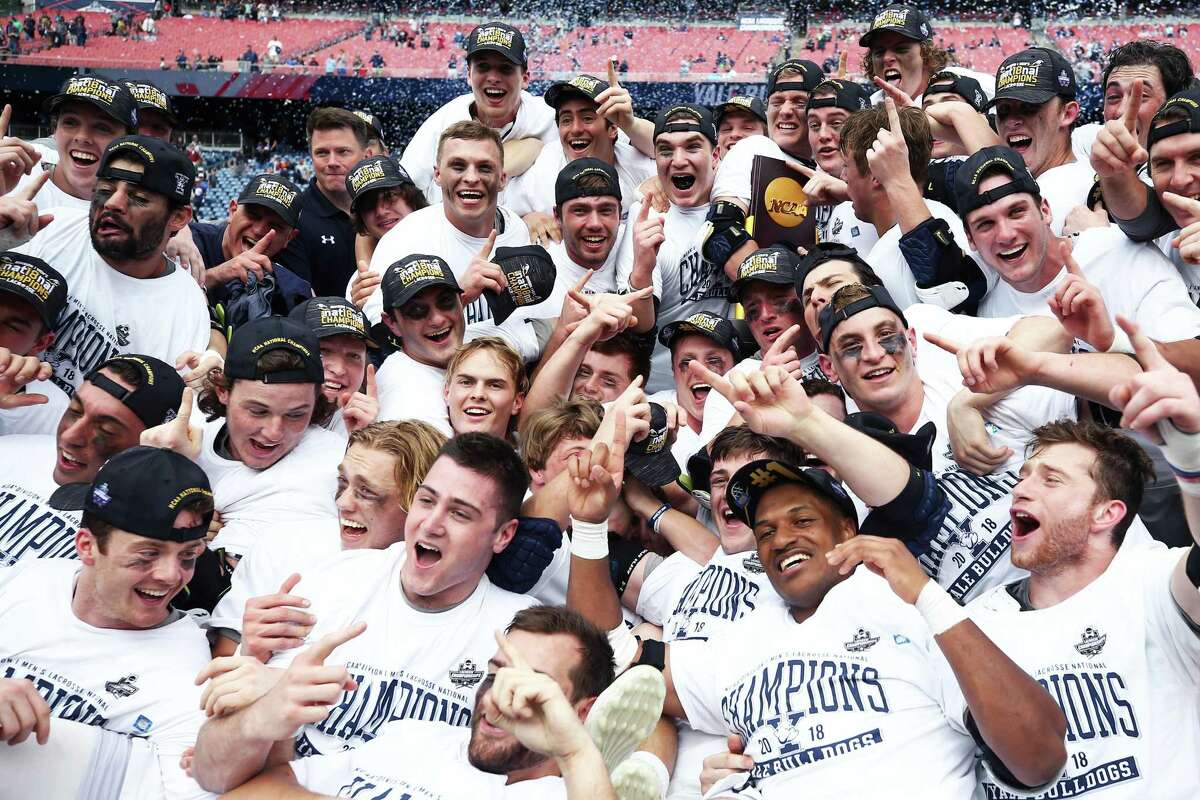 The Yale men’s lacrosse team celebrates after defeating Duke 13-11 in the NCAA championship game at Gillette Stadium on Monday in Foxborough, Mass.