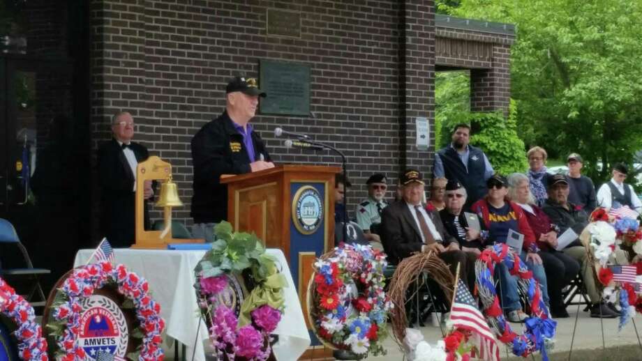 Veterans featured with names, photos during Torrington Memorial Day