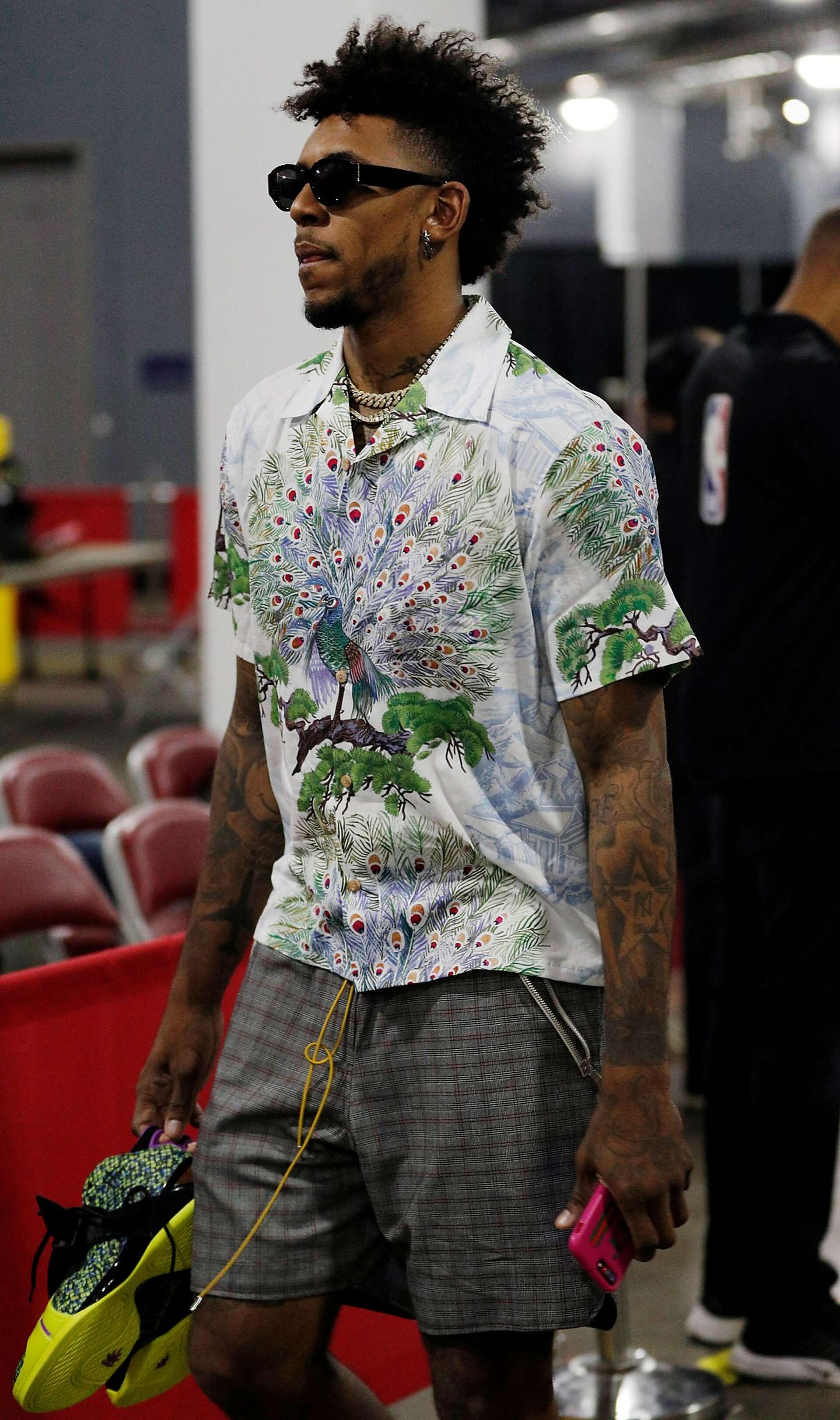 Nick Young apparently thought it was a good idea to get a neck tattoo in  Cleveland before Game 3, image size:1920x3244
