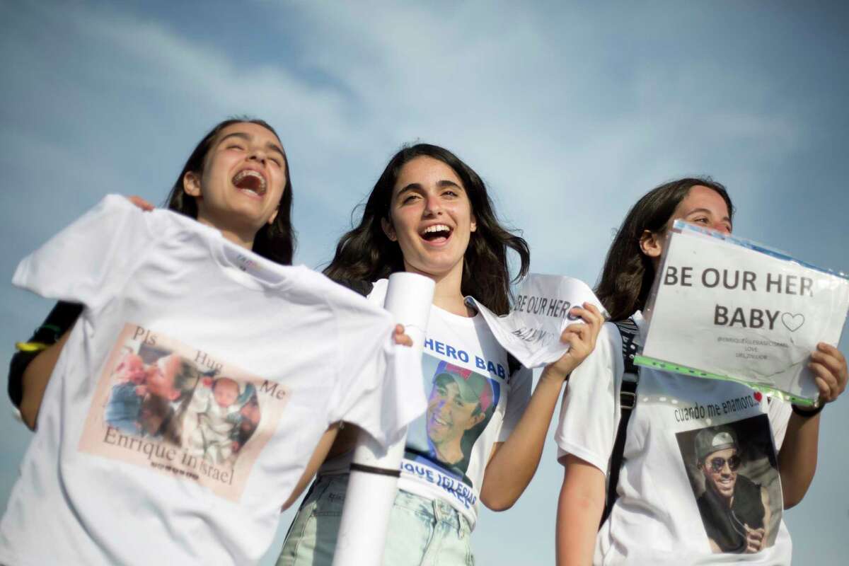 Fans sing ahead of Spanish singer Enrique Iglesias' concert in Tel Aviv, Israel, Sunday, May 27, 2018. (AP Photo/Ariel Schalit)
