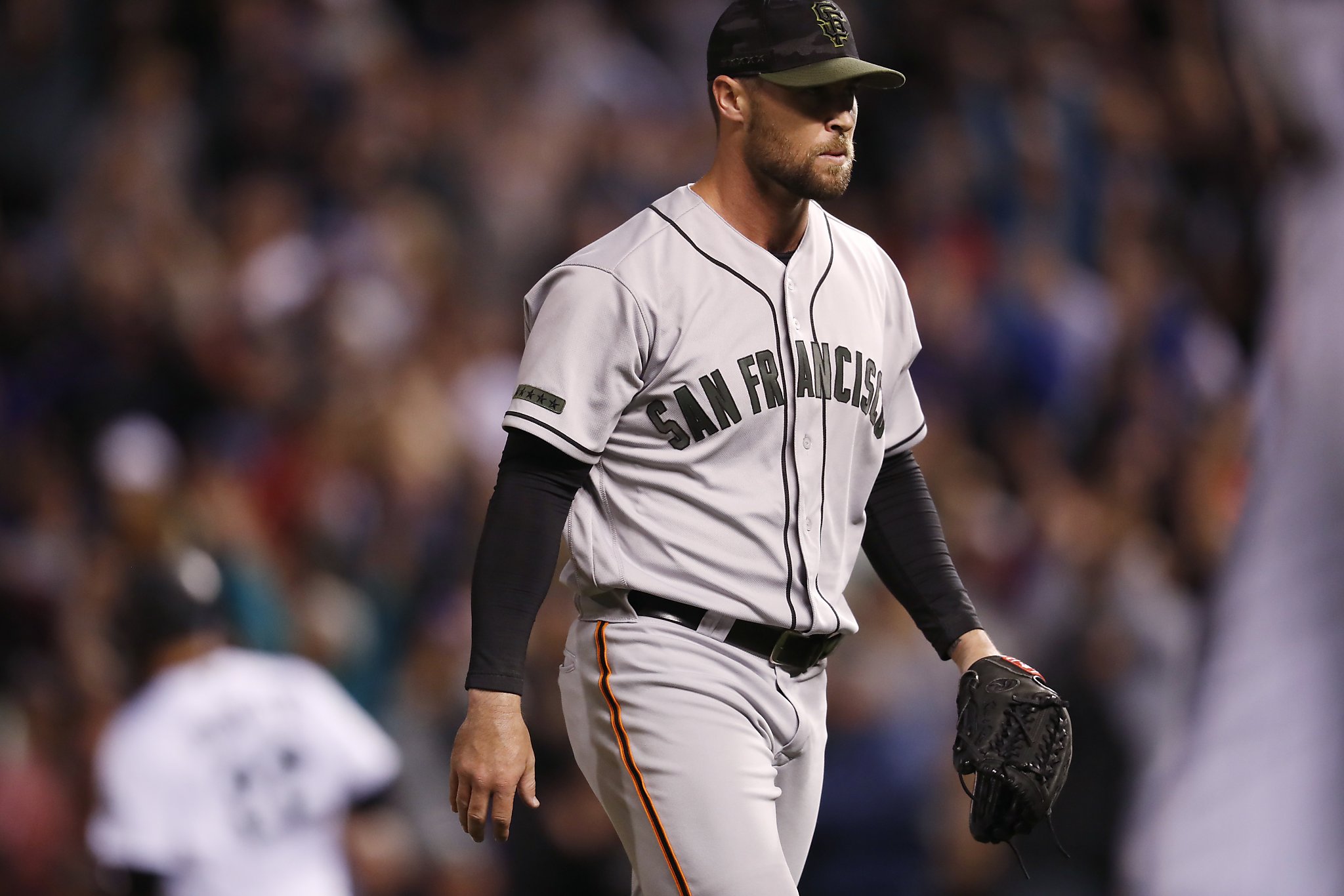 Giants' Strickland apologizes for self-inflicted injury