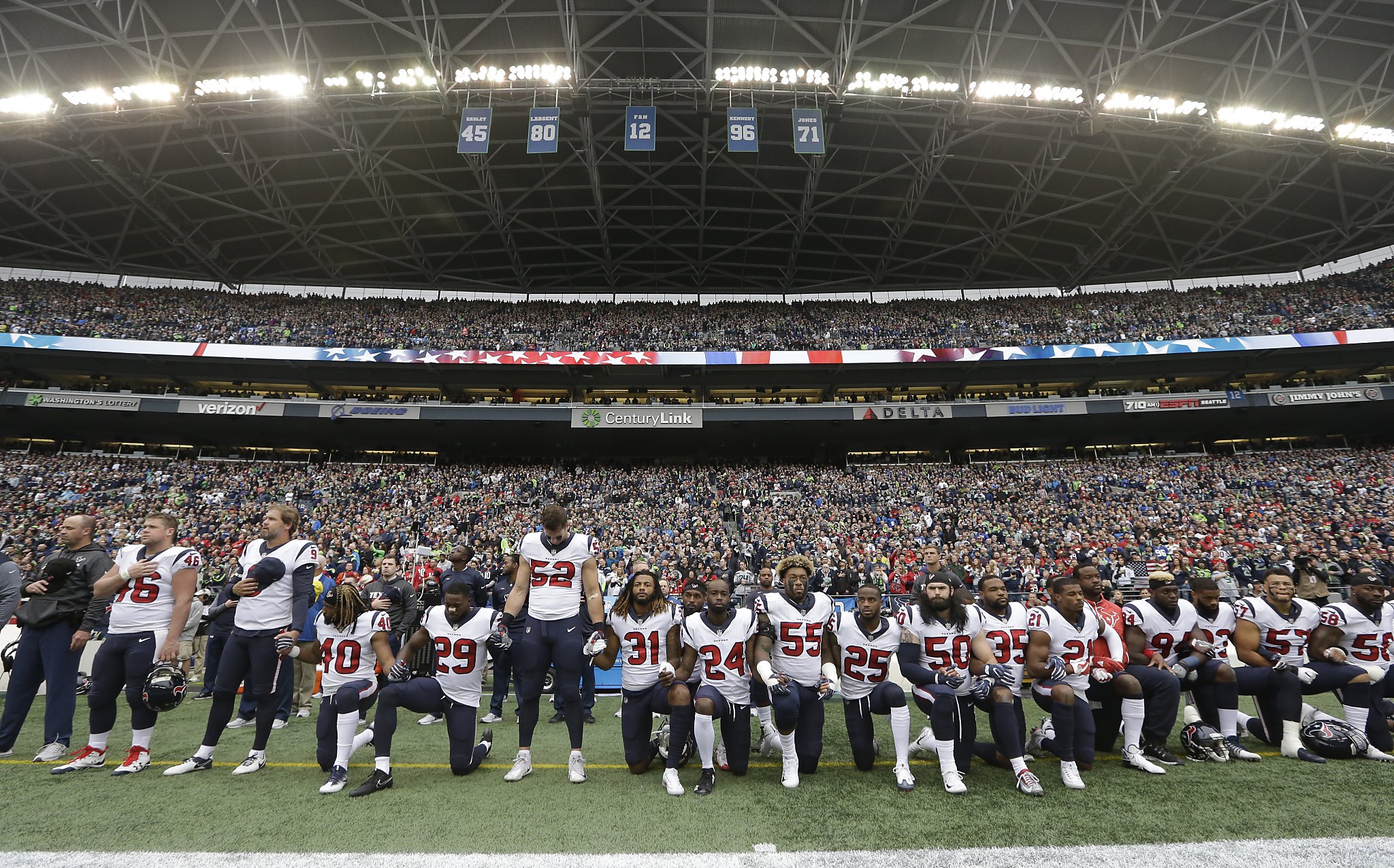 49ers cheerleader takes a knee during national anthem at Raiders