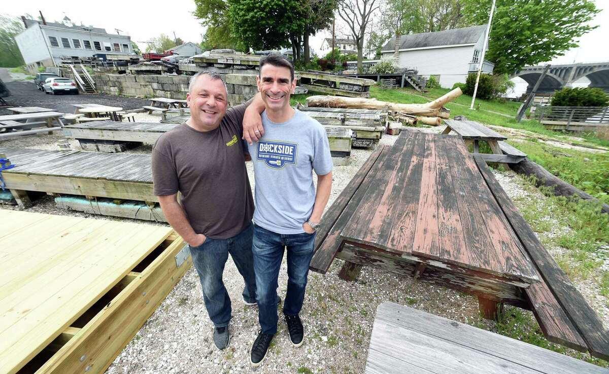Dan Bagley (left) and Bob Chicoine, photographed on May 15, 2018 have plans to build Dockside, a waterfront biergarten and brewery, at this location on Bridgeport Ave. in Milford.