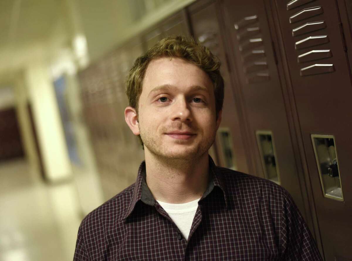 GHS history teacher Michael Belanger, author of "The History of Jane Doe," poses at Greenwich High School in Greenwich, Conn. Wednesday, May 23, 2018. Belanger's young adult novel, on sale June 5, features a teenage history buff, Ray, intrigued by the new girl in town, touching on first love and loss, teenage mental health, and the power of history to give life meaning.