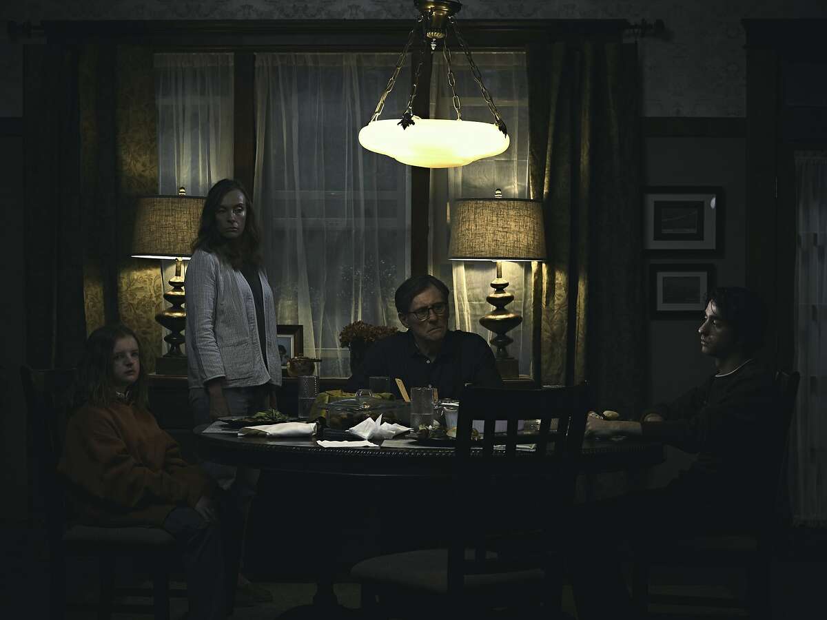 Toni Collette (center, left) and Gabriel Byrne (center, right) lead what might be a cursed family in �Hereditary.� Photo credit: A24