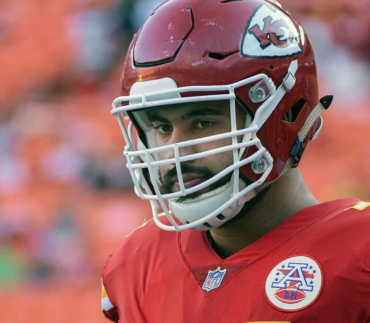 FILE - In this Aug. 11, 2017, file photo, Kansas City Chiefs offensive lineman Laurent Duvernay-Tardif (76) is shown during pre-game warmups before an NFL preseason football game in Kansas City, Mo. Chiefs offensive lineman Laurent Duvernay-Tardif can finally put away the medical books for a while and spend all his free time studying up his playbook. Duvernay-Tardif graduated from McGill University's medical school on Tuesday, May 29, 2018. (AP Photo/Reed Hoffmann, File)