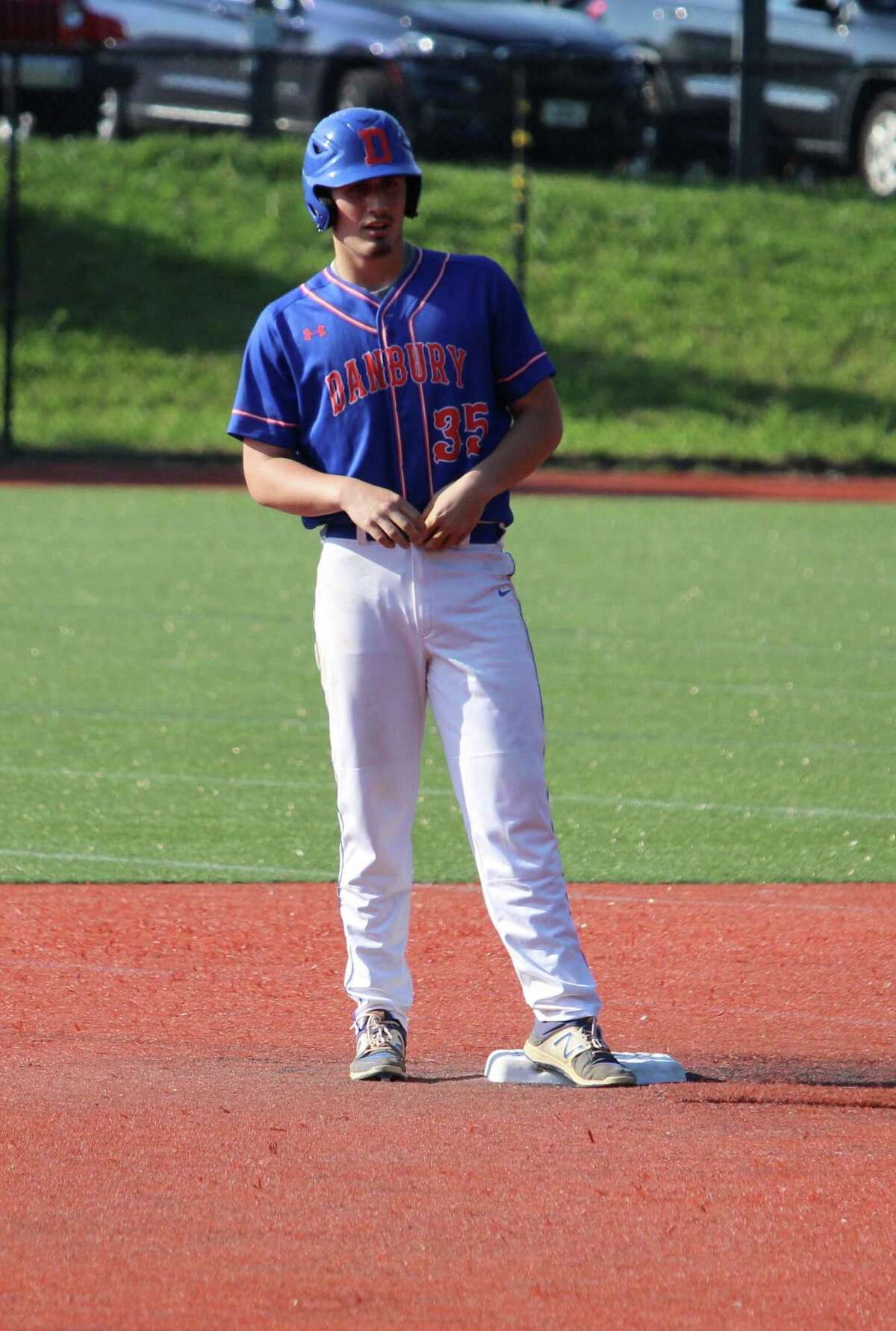 Danbury's Justin Solimine stands on second after an RBI base-hit during a Class LL state playoff baseball game between Darien and Danbury at Darien High School in Darien, Conn on May 28, 2018. Danbury defeated Darien 7-3.