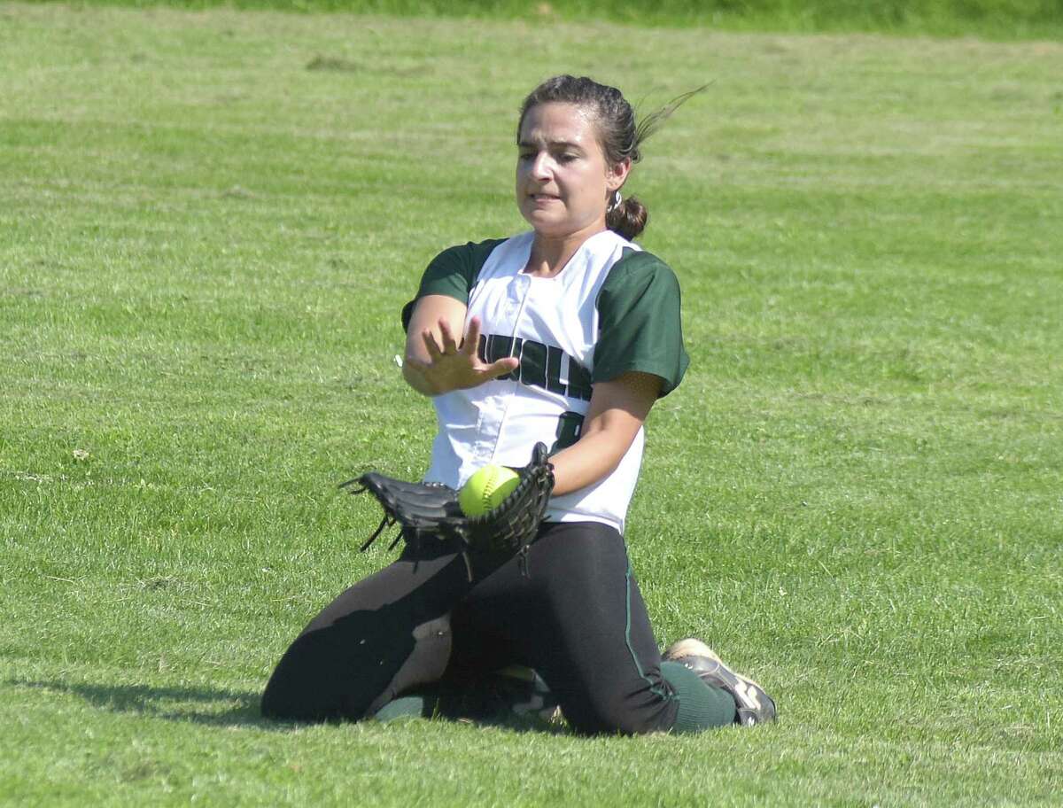 Norwalk right fielder Gabby Catino makes a knees-first sliding catch during Tuesdays CIAC Class LL first-round state tournament softball game at Red Barry Field in Norwalk. West Haven defeated the host Bears 4-1.