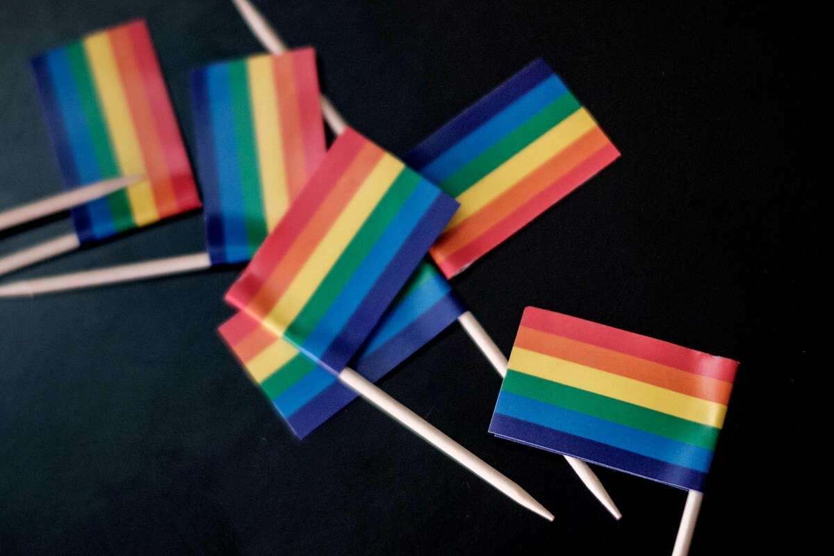 Miniature rainbow flags are offered during the UN GLOBE event celebrating first time on the International Day against Homophobia and Transphobia (IDAHOT), on May 17, 2018, at United Nations Office in Nairobi, Kenya. 
