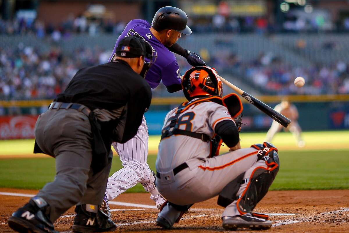 DENVER, CO - MAY 29: Trevor Story #27 of the Colorado Rockies hits an RBI triple off of Jeff Samardzija of the San Francisco Giants during the first inning at Coors Field on May 29, 2018 in Denver, Colorado. (Photo by Justin Edmonds/Getty Images)