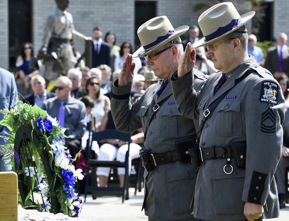 State Police held the 42nd Annual Memorial Service and Awards Ceremony on Wednesday, May 30, 2018, at the State Police Academy in Albany. Three fallen members were remembered, including Trooper Michael Anson of Troop G, who died of cancer stemming from his work at the World Trade Center site following the 9/11 terrorist attacks. (Skip Dickstein/Times Union) Photo: Skip Dickstein/Times Union