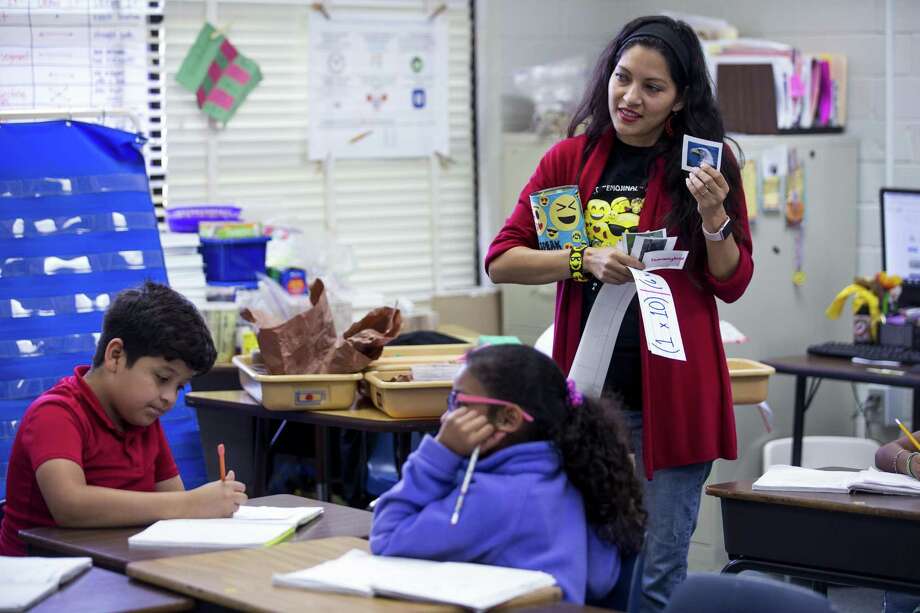 Fourth grade teacher Gabriella Bogani works with her class at Jackson Elementary School in Rosenberg. The Lamar CISD school jumped from 405th to 148th in the annual rankings. Photo: Brett Coomer, Staff / Houston Chronicle / © 2018 Houston Chronicle