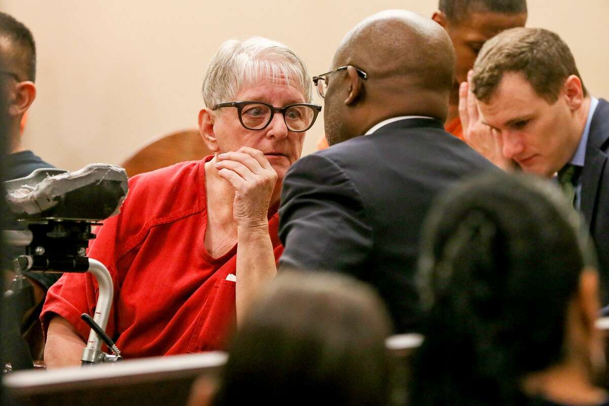 Convicted child killer Genene Jones talks with defense attorney Cornelius Cox on May 20, 2018, after Criminal Magistrate Judge Andrew Carruthers approved Cox's request for competency and sanity evaluations during a hearing in his court. Jones has been charged with five new counts of murder in the deaths of five San Antonio children.