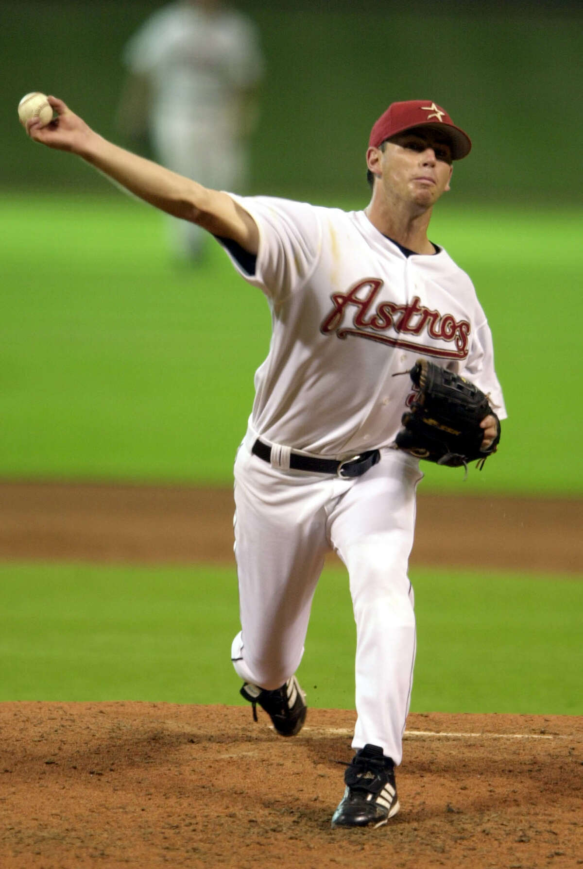 Houston Astros starting pitcher Kirk Saarloos delivers a pitch in the sixth inning against the Pittsburgh Pirates on Thursday, July 25, 2002, in Houston. Saarloos pitched his first major-league complete game and shutout, giving up six hits and striking out six in the Astros' 8-0 win.