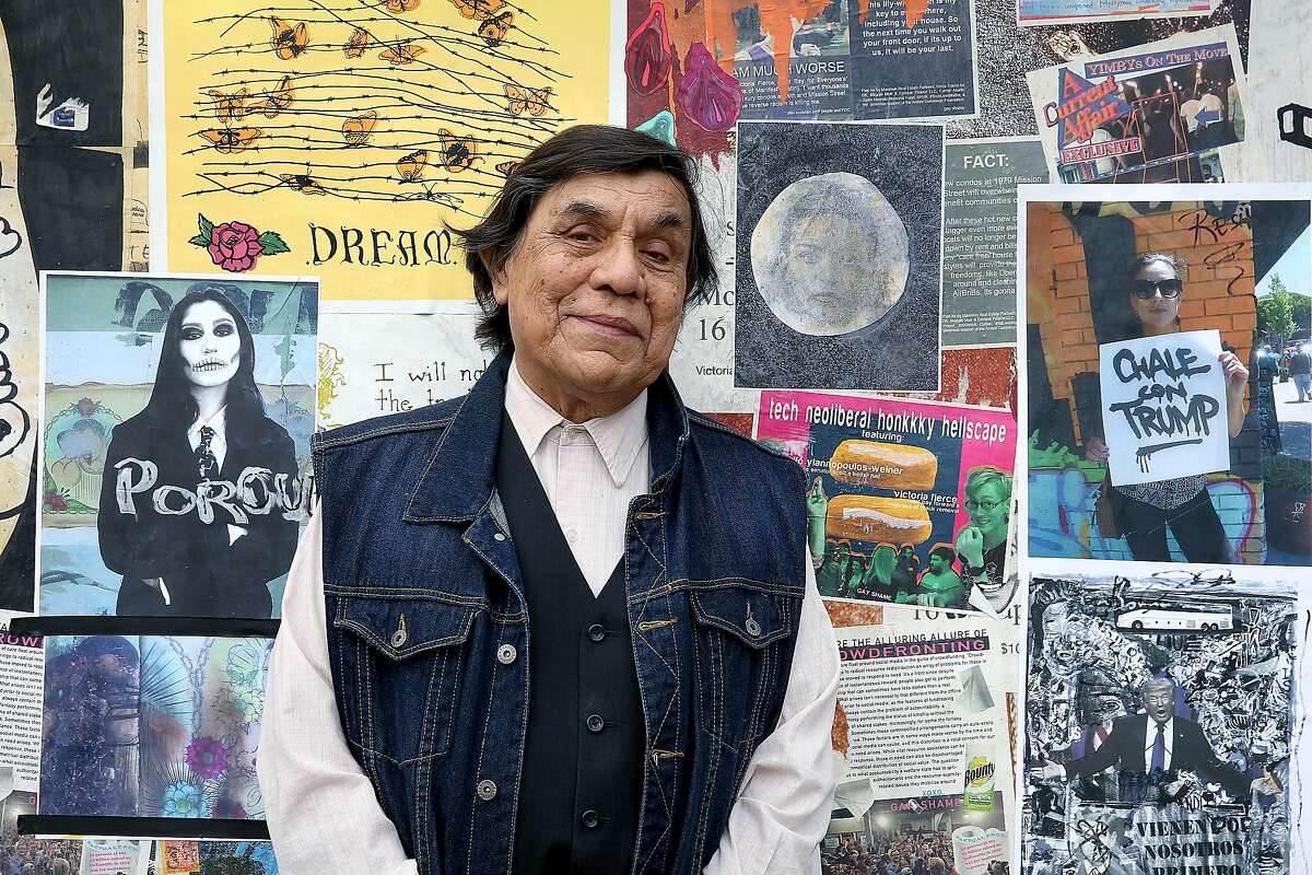 Artist Ren� Ya�ez who popularized Dia de los Muertos and Frida Kahlo pastes his art on a wall fronting the jail cells of the former Mission Police Station at dAP Parklet on Friday, December 15, 2017, in San Francisco, Ca.