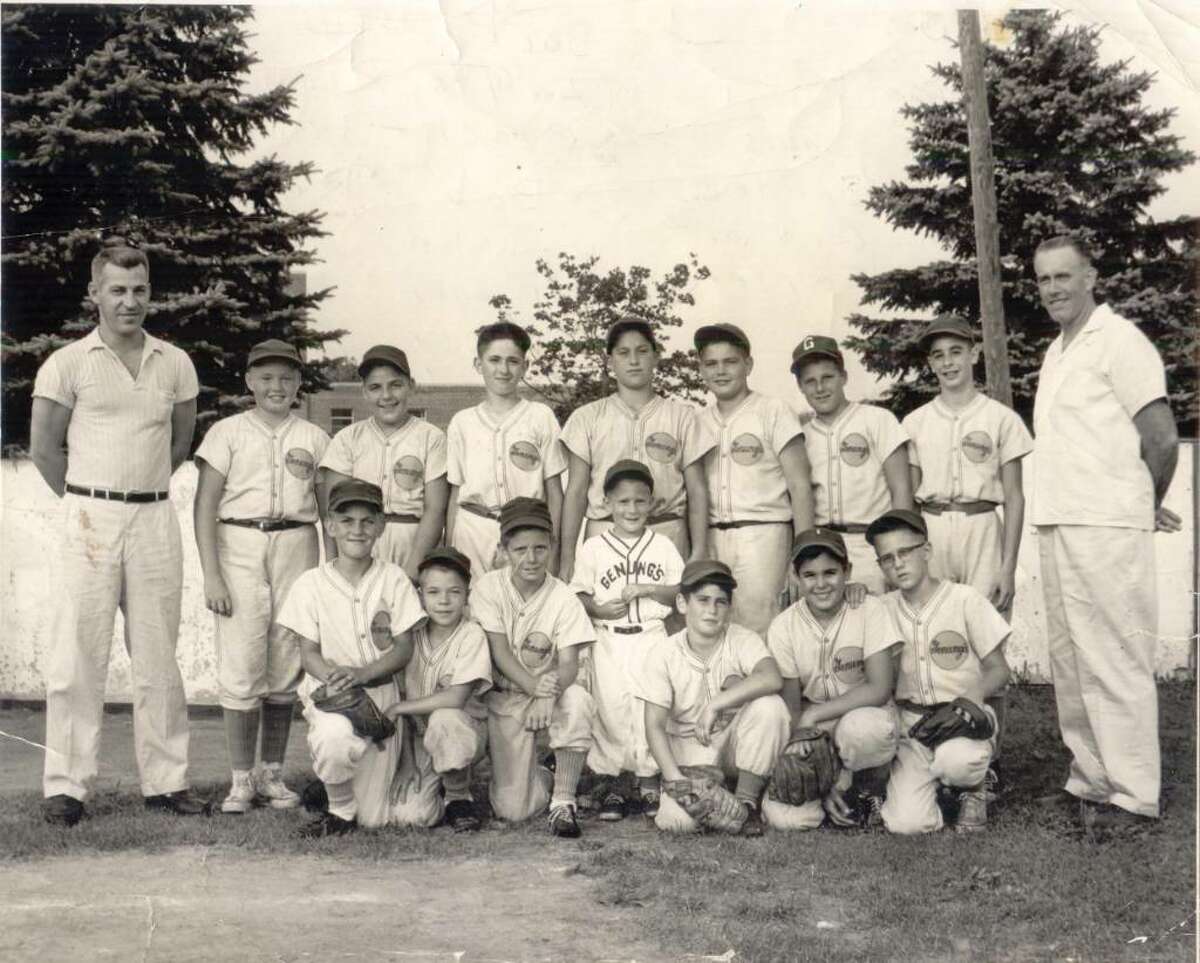 This photograph, from the collection of Marguerite Davis of Bethel, is of the Genung Little League team at Rogers Park in Danbury in 1959. Shown are, in front row, from left, Norman E. Davis Jr., Robert Kuretelc, William Goddart, Michel Kayser, James, Joe, John Kayser, coach Kayser; in the back row from left, coach John Kayser Sr., Bob Reedie, John Rogers, Roger Murphy, Dave Montesi, Mike, Stephen Sprindes, Paul Segal and coach Reedy.