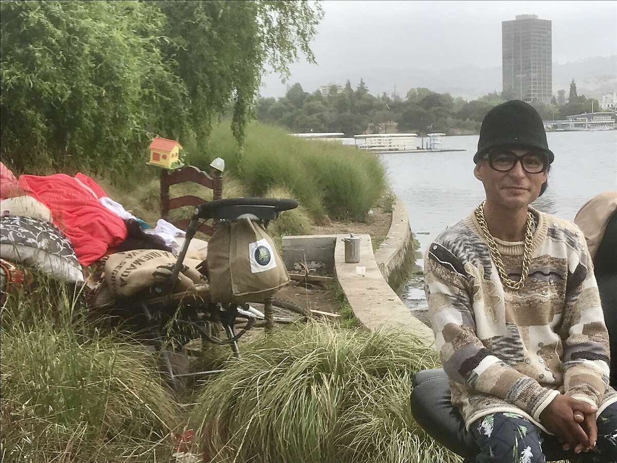 Manuel Sanchez, 40, prepares to move from encampment at Lake Merritt. City gave him until Wednesday to leave, as it cleans up area ahead of Oakland hosting NBA championship starting this week.