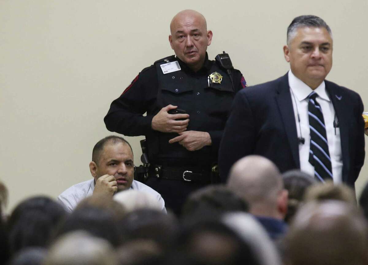 Mexican national Gustavo Tijerina-Sandoval (lower left in background) sits in front of the jury pool in his capital murder trial in the Cameron County 197th District Court in Brownsville in this Feb. 13 photo. One of his attorneys, Nat Perez, Jr. stands nearby.