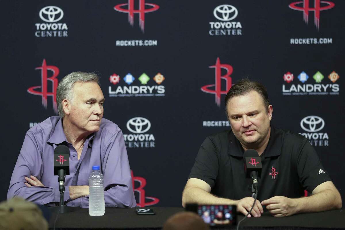 Rockets coach Mike D’Antoni, left, and general manager Daryl Morey have a pair of open roster spots to fill before the season resumes Thursday against the Lakers.