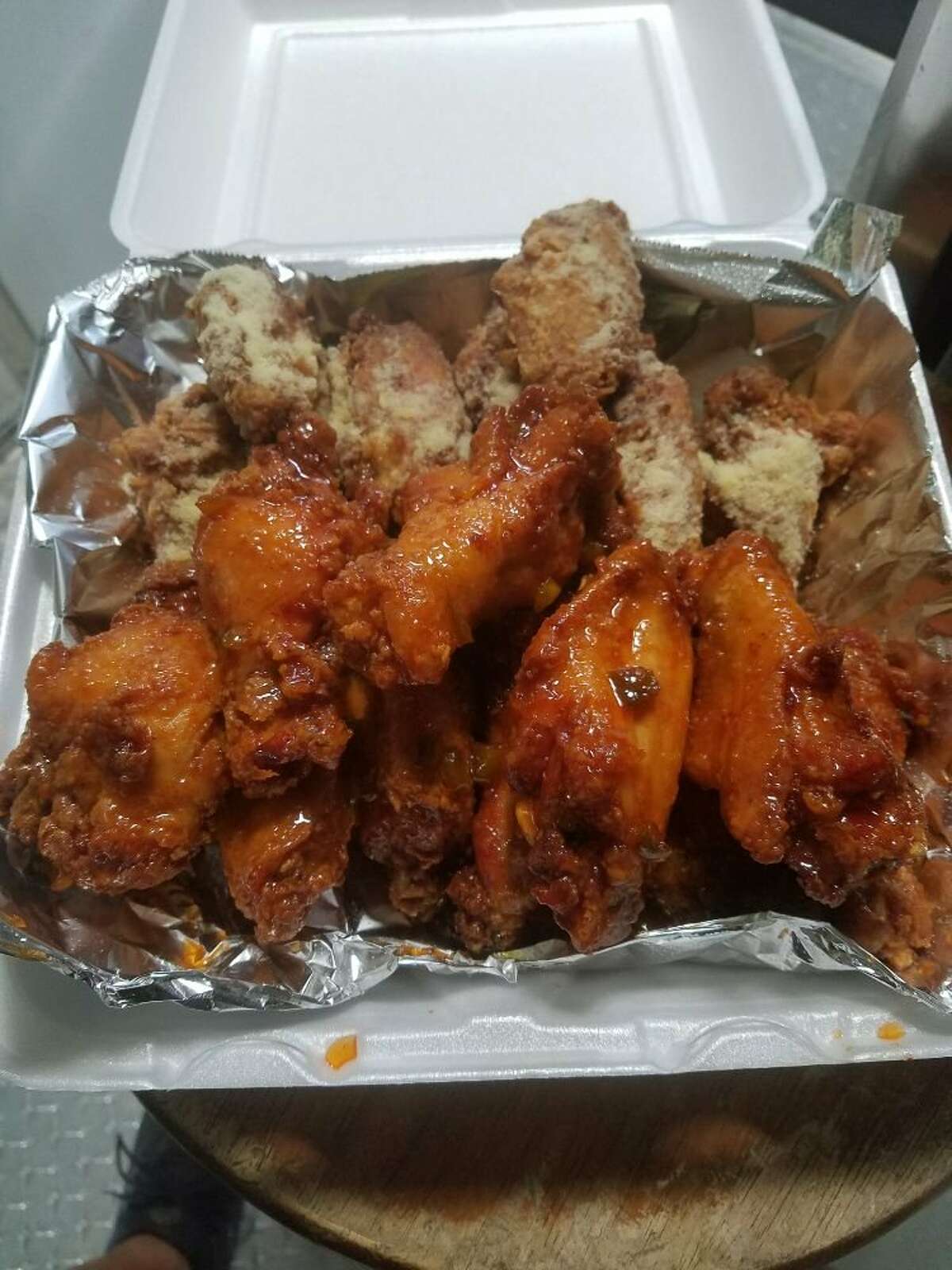 15. Pat's Wings on Wheels Address: Mobile food trucks Stars: 4 "...overall the buffalo wings were good and so were the garlic Parm except the parmesan cheese on it was really strong in my opinion."