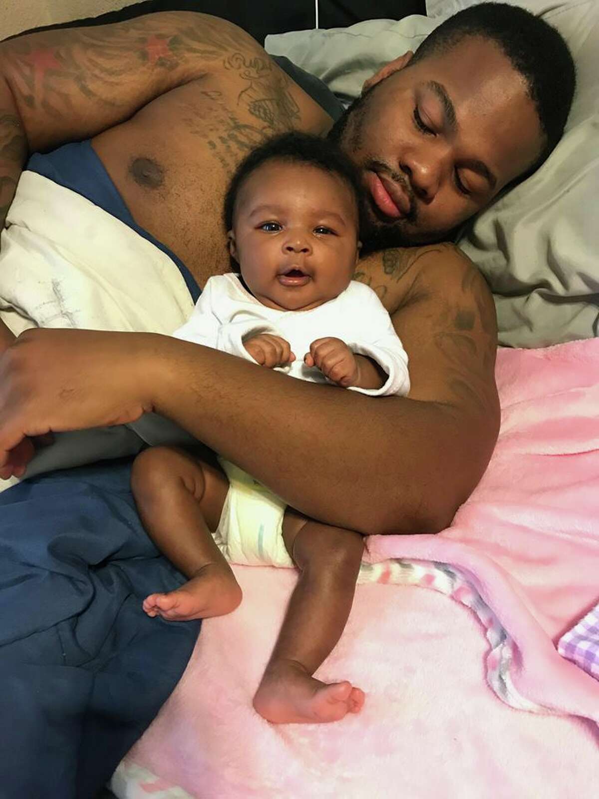 Demontae Walker, 25, with his daughter, Samiyah. A mugshot for Walker is not yet available.