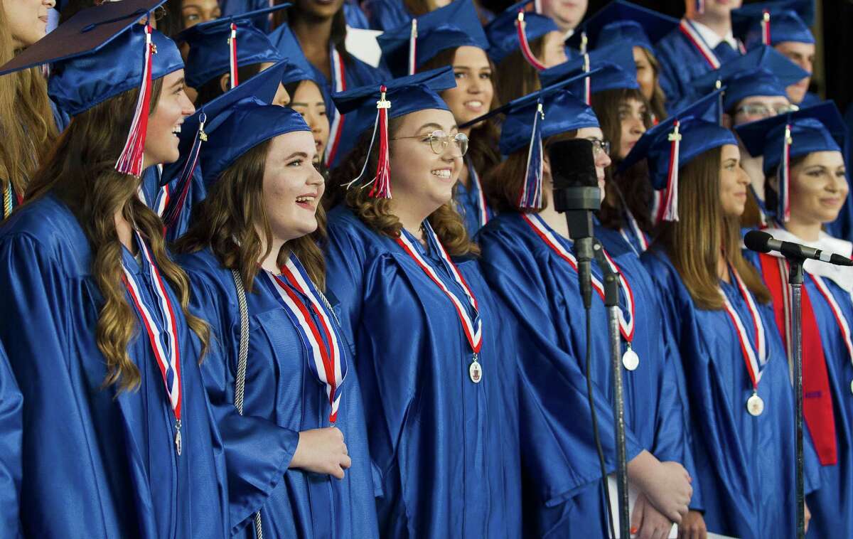 Members of the Oak Ridge choir sing during Oak Ridge High School's graduation ceremony at Cynthia Woods Mitchell Pavilion on Thursday, May 30, 2018, in The Woodlands.