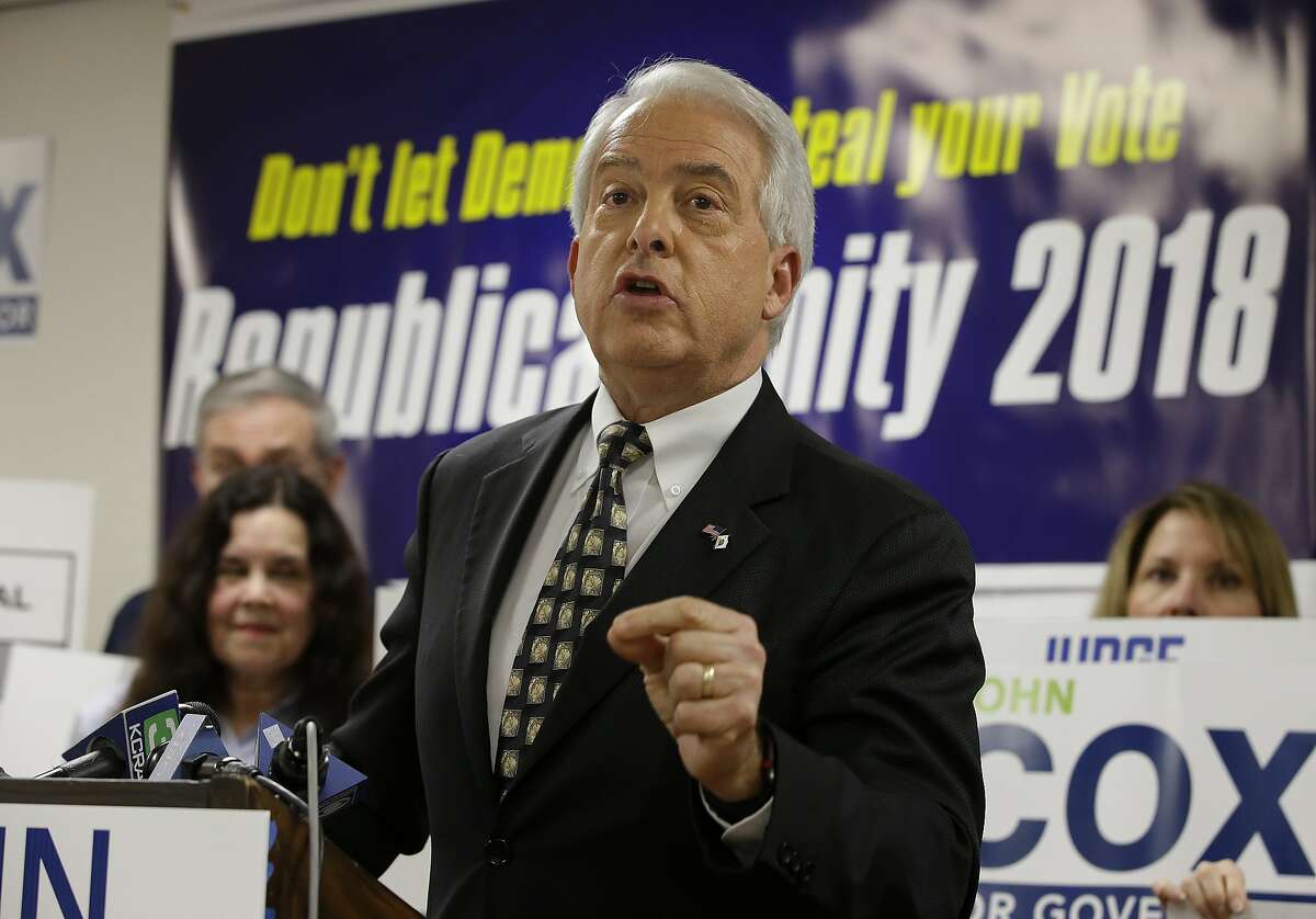 FILE - In this May 23, 2018, file photo, Republican gubernatorial candidate John Cox address supporters at the Sacramento County Republican Party headquarters in Sacramento, Calif.