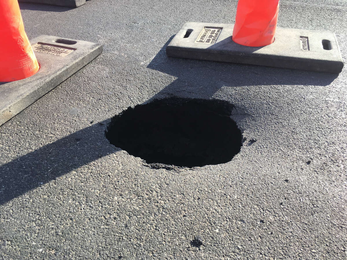 A sinkhole about the size of a basketball formed Thursday in the right northbound lane on Midkiff Road near the intersection with Golf Course Road. The city closed the lane as it addresses the issue.