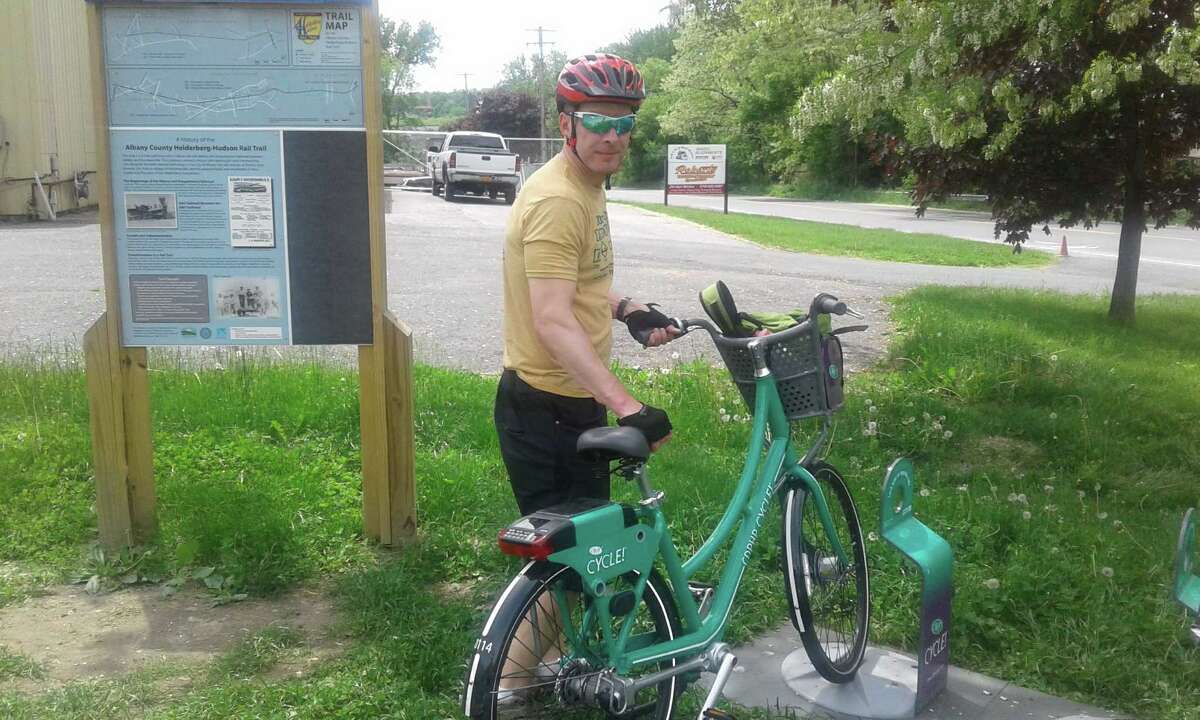 Herb Terns selects a bike from the CDPHP Cycle! program. (Gillian Scott / Special to the Times Union)